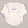 White Long Sleeve Baby Boy Romper Leo Personalised white chunky knit long sleeve baby boy romper with blue embroidered name and button shoulders