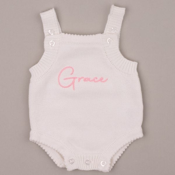 White Baby Girl Knitted Romper With Name Grace White knitted baby romper embroidered with the name βGraceβ in pink script.
