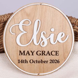 Personalised round wooden nursery plaque with Willow in white and Harper Grace engraved with pink heart and birth detail fields