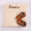 Cream Diamond Knitted Baby Blanket & Tbar Shoes Sophie Personalised cream diamond knit baby blanket with brown embroidered name and tan leather T-bar baby shoes