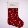 Burgundy & Gold Baby Christmas Stocking Oliver Personalised burgundy velvet baby Christmas stocking with gold snowflake print and gold Oliver embroidery on white cuff