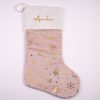 Light Pink & Gold Baby Christmas Stocking Amelia Personalised light pink velvet baby Christmas stocking with gold snowflake print and gold Amelia embroidery on white cuff