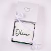 Personalised pine green velvet baby Christmas stocking with dark green Oliver embroidery presented in a One Little Day gift box