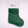 Personalised pine green velvet baby Christmas stocking with dark green Oliver embroidery on white cuff
