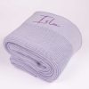 Lavender Mottled Knitted Baby Blanket Folded Folded personalised lavender mottled knit baby blanket with purple name embroidery on ribbed border