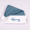 Sky Blue Baby Christmas Hat Henry Personalised sky blue velvet baby Santa hat with blue Henry embroidery on white cuff and white pom pom
