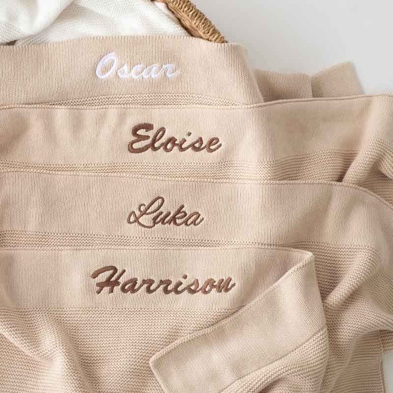 Variety Of Beige Knitted Baby Blankets - Showcasing Different Fonts.